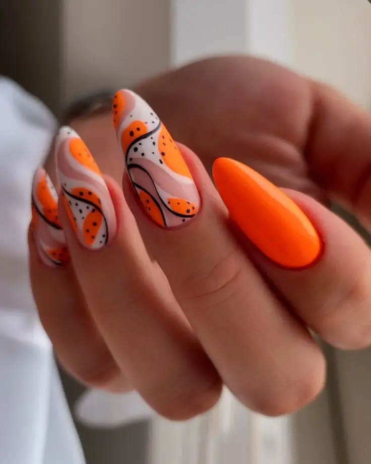 Трендовые оранжевые оттенки маникюра 2025: 15 идей стильного nail-дизайна