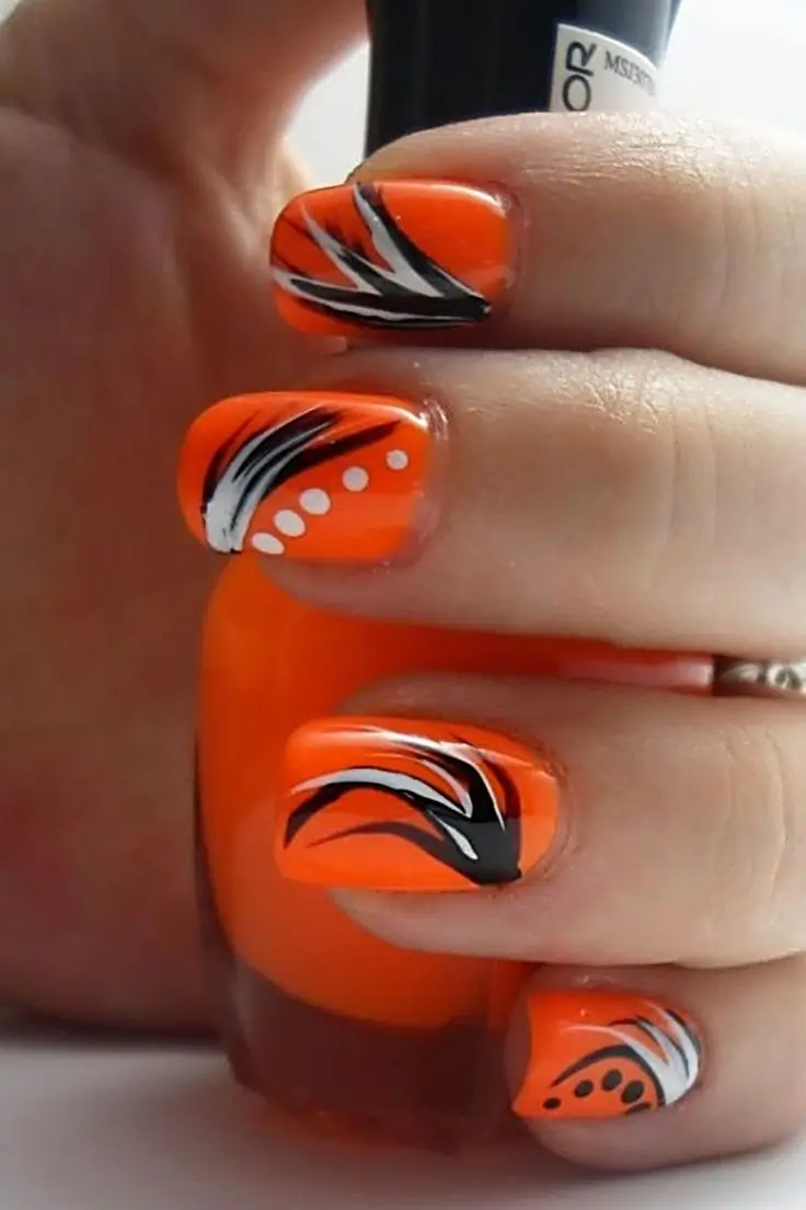 Трендовые оранжевые оттенки маникюра 2025: 15 идей стильного nail-дизайна